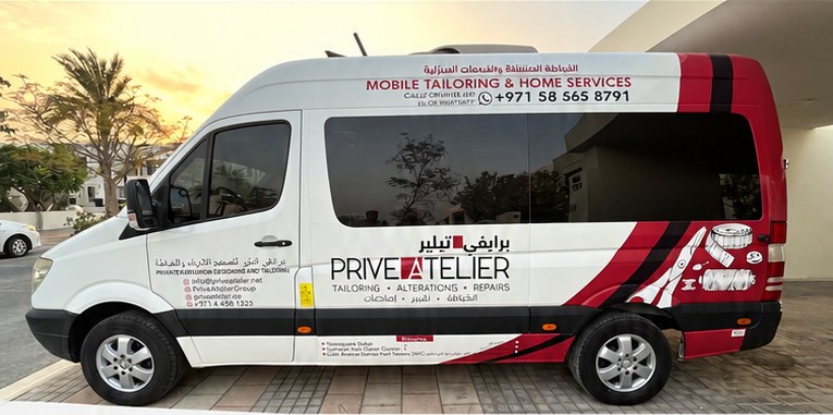 The Privé Atelier mobile tailoring van at sunset